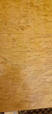 Lot 78 - An Art Deco burr maple dining suite