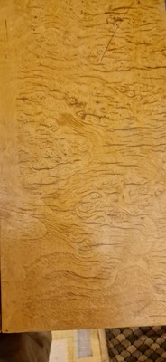 Lot 78 - An Art Deco burr maple dining suite