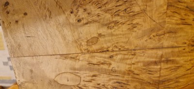 Lot 78 - An Art Deco burr maple dining suite