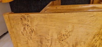 Lot 78 - An Art Deco burr maple dining suite