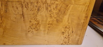 Lot 78 - An Art Deco burr maple dining suite