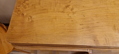Lot 78 - An Art Deco burr maple dining suite