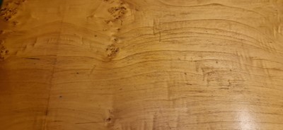 Lot 78 - An Art Deco burr maple dining suite
