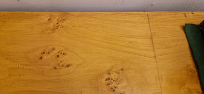 Lot 78 - An Art Deco burr maple dining suite