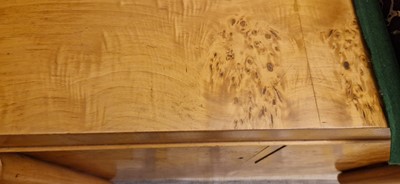 Lot 78 - An Art Deco burr maple dining suite