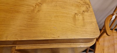 Lot 78 - An Art Deco burr maple dining suite