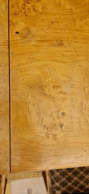 Lot 78 - An Art Deco burr maple dining suite