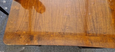 Lot 48 - An Art Deco walnut dining table