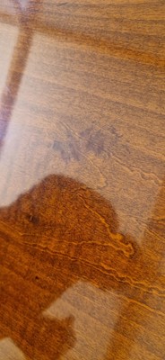 Lot 48 - An Art Deco walnut dining table