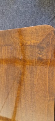 Lot 48 - An Art Deco walnut dining table