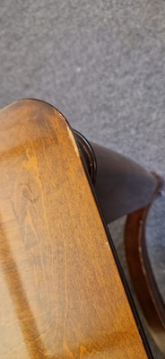 Lot 48 - An Art Deco walnut dining table