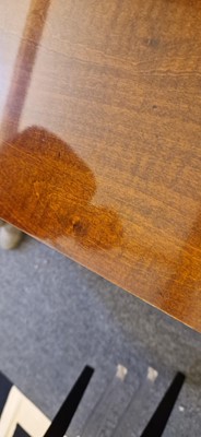 Lot 48 - An Art Deco walnut dining table