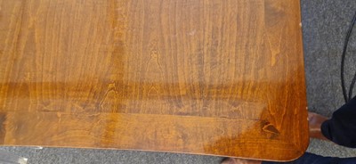 Lot 48 - An Art Deco walnut dining table