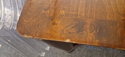 Lot 48 - An Art Deco walnut dining table