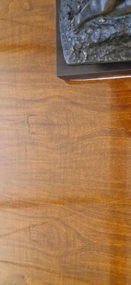 Lot 48 - An Art Deco walnut dining table