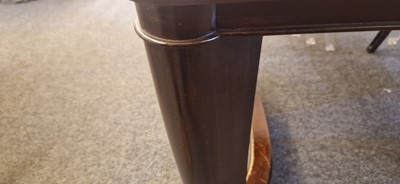 Lot 48 - An Art Deco walnut dining table