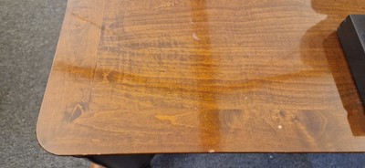 Lot 48 - An Art Deco walnut dining table