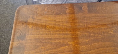 Lot 48 - An Art Deco walnut dining table