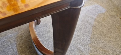 Lot 48 - An Art Deco walnut dining table