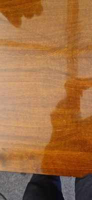 Lot 48 - An Art Deco walnut dining table