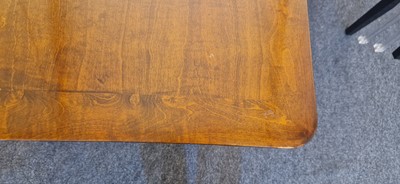 Lot 48 - An Art Deco walnut dining table