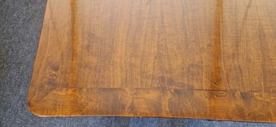Lot 48 - An Art Deco walnut dining table