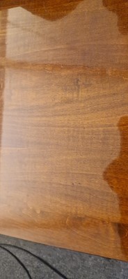 Lot 48 - An Art Deco walnut dining table
