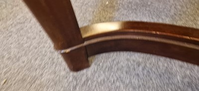 Lot 48 - An Art Deco walnut dining table