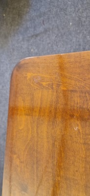 Lot 48 - An Art Deco walnut dining table