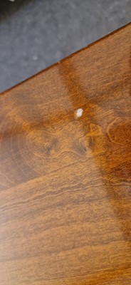 Lot 48 - An Art Deco walnut dining table