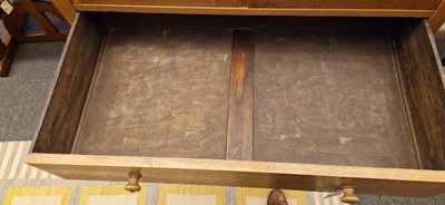 Lot 77 - A Heal's 'Letchworth' oak tallboy