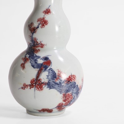 Lot 61 - A Chinese iron-red and underglaze blue wall vase