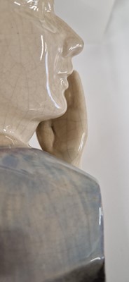 Lot 75 - A pair of French Art Deco pottery 'The Secret' bookends