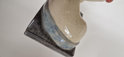 Lot 75 - A pair of French Art Deco pottery 'The Secret' bookends
