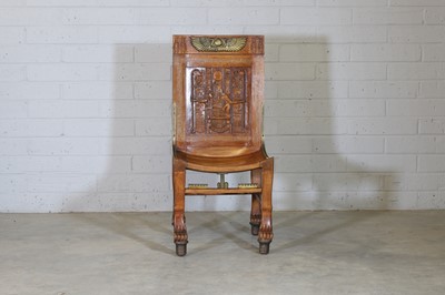 Lot 68 - An 'Egyptomania' brass-mounted stained beech chair