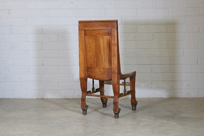 Lot 68 - An 'Egyptomania' brass-mounted stained beech chair