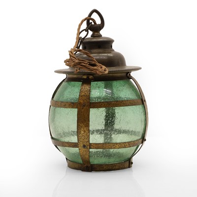 Lot 184 - An Arts and Crafts copper and green glass lantern