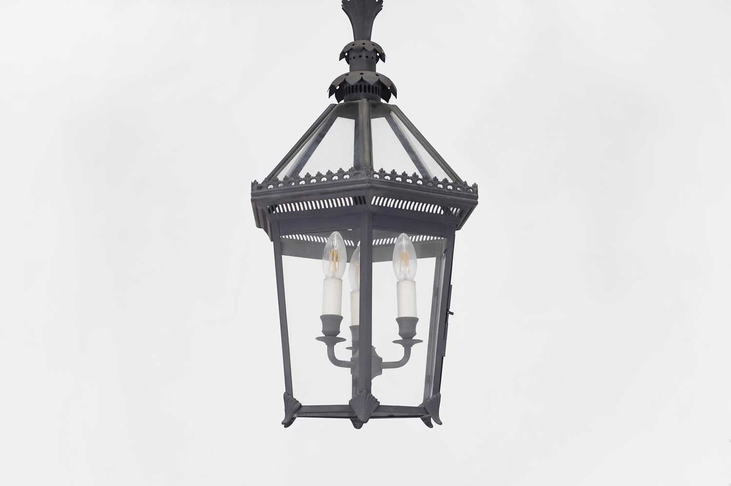 Lot 104 - A patinated metal 'Pineapple' lantern by Charles Edwards