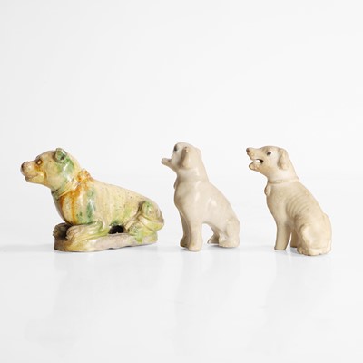 Lot 53 - A Chinese sancai-glazed dog