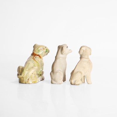 Lot 53 - A Chinese sancai-glazed dog