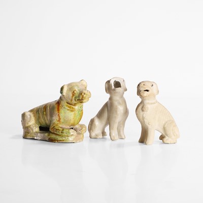 Lot 53 - A Chinese sancai-glazed dog