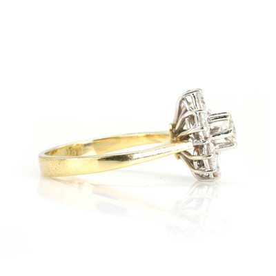 Lot 203 - An 18ct yellow and white gold seven stone diamond cluster ring