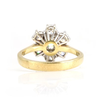Lot 203 - An 18ct yellow and white gold seven stone diamond cluster ring