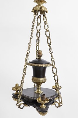 Lot 105 - A set of three Regency-style gilt and patinated bronze colza chandeliers