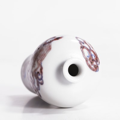 Lot 85 - A Chinese copper-red and underglaze blue snuff bottle
