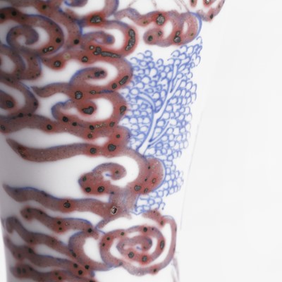Lot 85 - A Chinese copper-red and underglaze blue snuff bottle