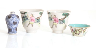 Lot 53 - A Chinese copper red and underglaze blue miniature vase