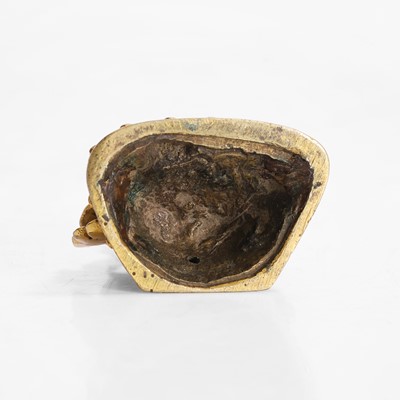 Lot 145 - A Tibetan gilt-bronze miniature bodhisattva