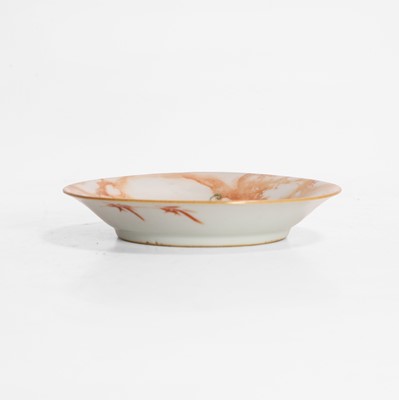 Lot 131 - A Chinese faux-marble enamelled porcelain saucer