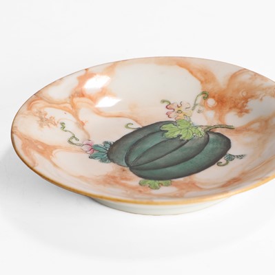 Lot 131 - A Chinese faux-marble enamelled porcelain saucer